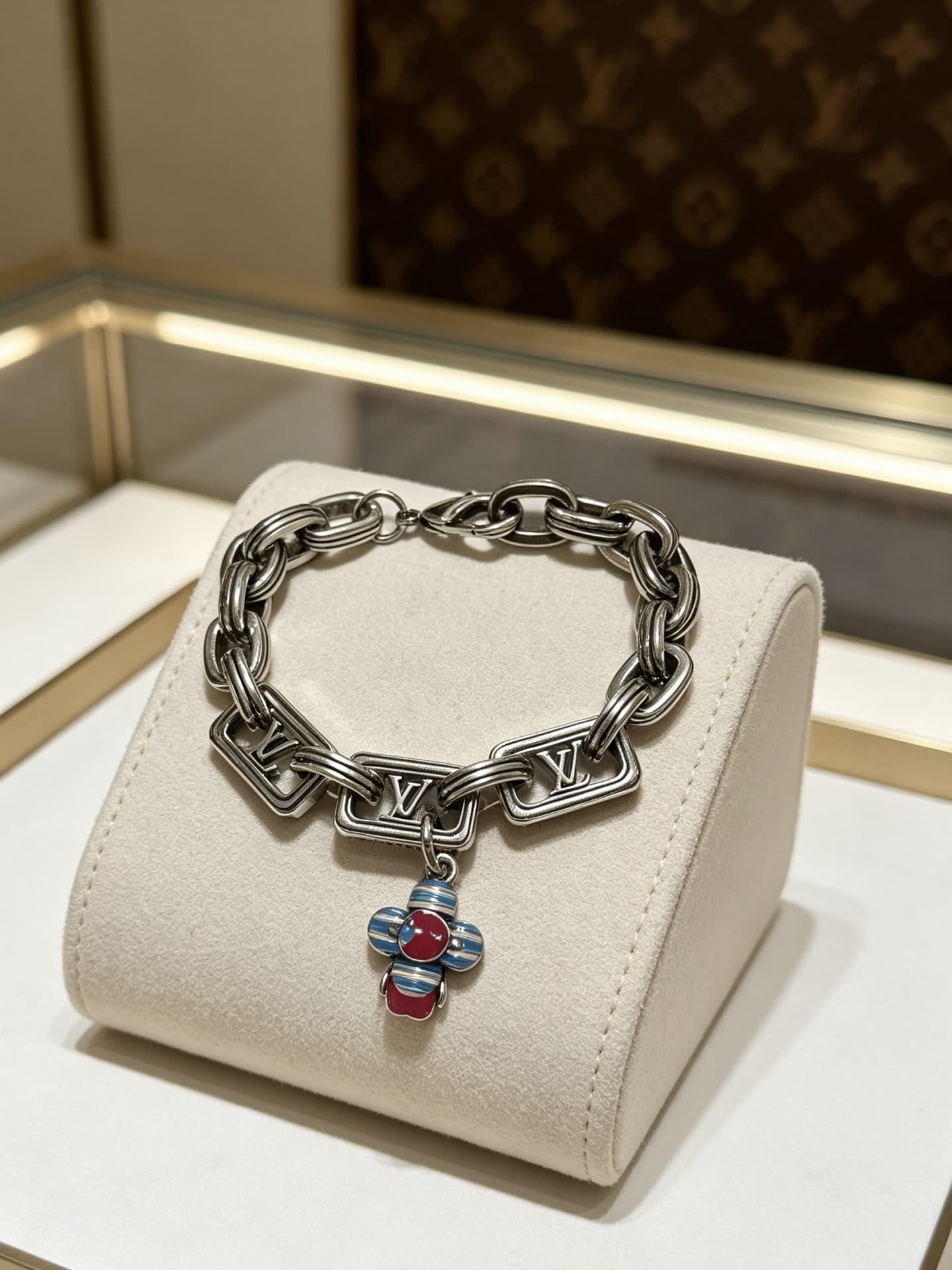 Louis Vuitton Silver Tone Bracelet with Monogram Charm